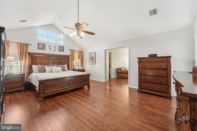 bedroom with multiple windows, dark wood-style floors, and visible vents