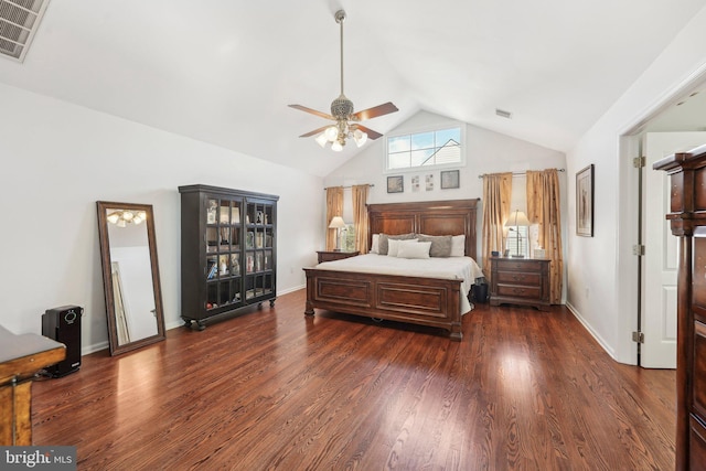 bedroom with visible vents, dark wood-type flooring, a ceiling fan, and vaulted ceiling