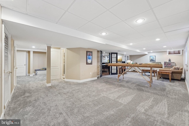 recreation room with recessed lighting, baseboards, and light carpet