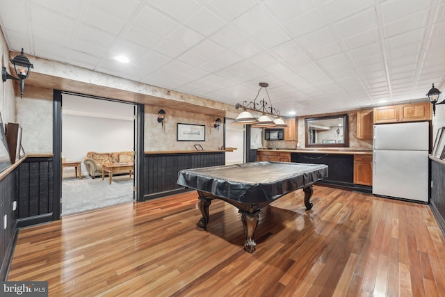 game room featuring billiards and light wood finished floors