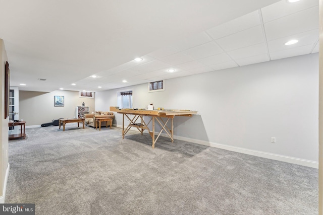 recreation room with recessed lighting, a paneled ceiling, baseboards, and carpet flooring