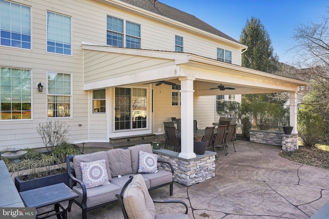 view of patio / terrace featuring outdoor dining space, outdoor lounge area, and ceiling fan