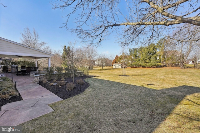 view of yard with a patio area