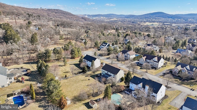 bird's eye view with a residential view and a mountain view