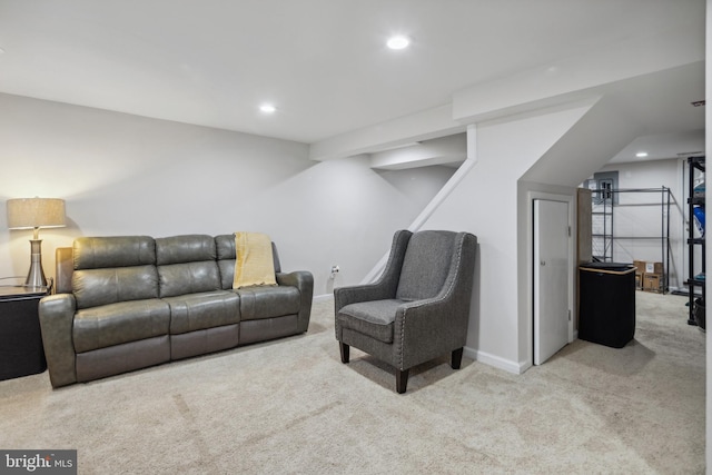 living room featuring recessed lighting, baseboards, and carpet floors