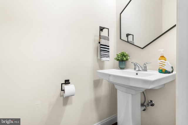 bathroom featuring baseboards