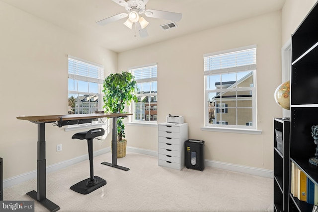 workout room featuring visible vents, ceiling fan, baseboards, and carpet