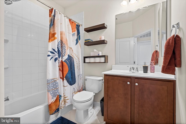 bathroom featuring tile patterned floors, shower / bath combo with shower curtain, toilet, and vanity