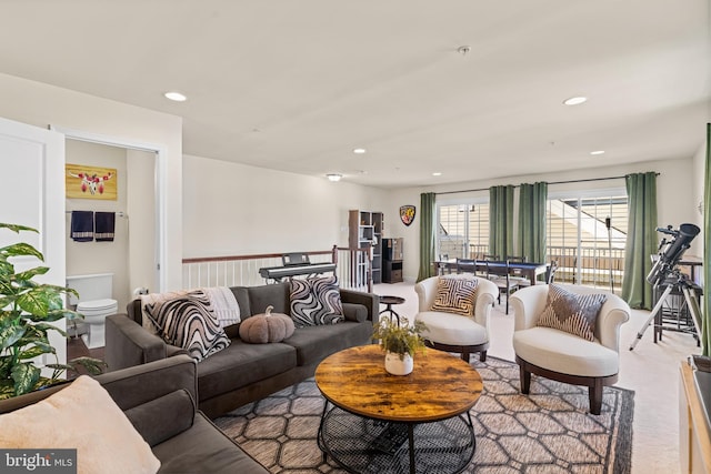 living room with recessed lighting and carpet