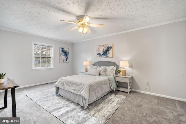 bedroom with baseboards, carpet, ornamental molding, and a textured ceiling