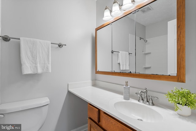 full bath with visible vents, toilet, a textured ceiling, a shower, and vanity