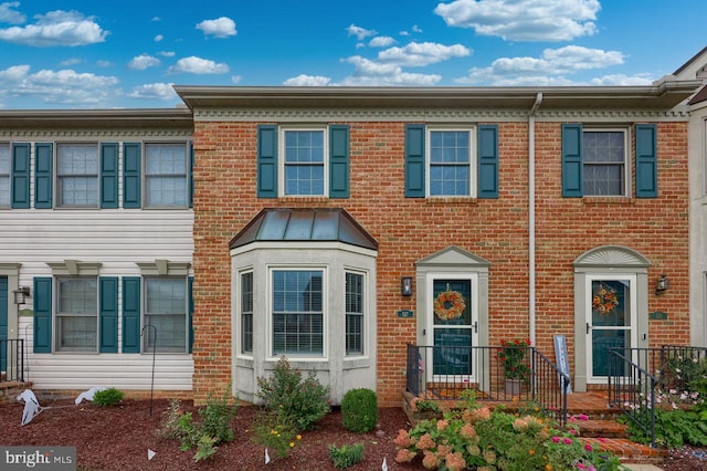 multi unit property featuring brick siding