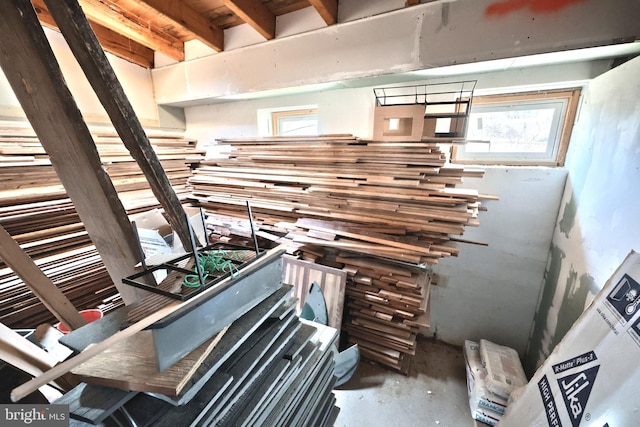 miscellaneous room with unfinished concrete flooring