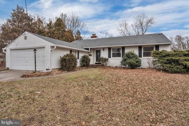 ranch-style house with driveway, a front yard, an attached garage, brick siding, and a chimney