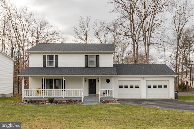 traditional-style home with a front lawn, driveway, a porch, roof with shingles, and an attached garage