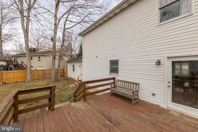 wooden deck featuring fence