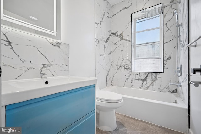 full bathroom with  shower combination, toilet, and vanity