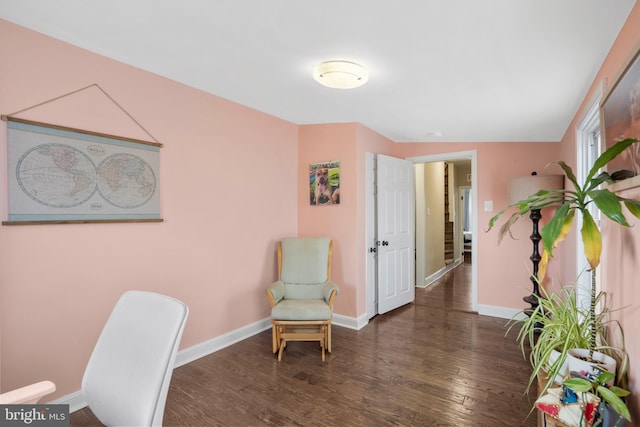 office area with wood finished floors and baseboards