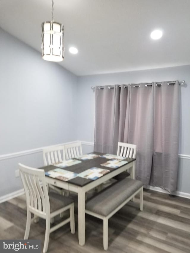 dining room featuring recessed lighting, baseboards, and wood finished floors