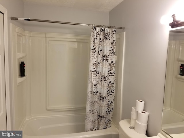 full bathroom with shower / tub combo with curtain