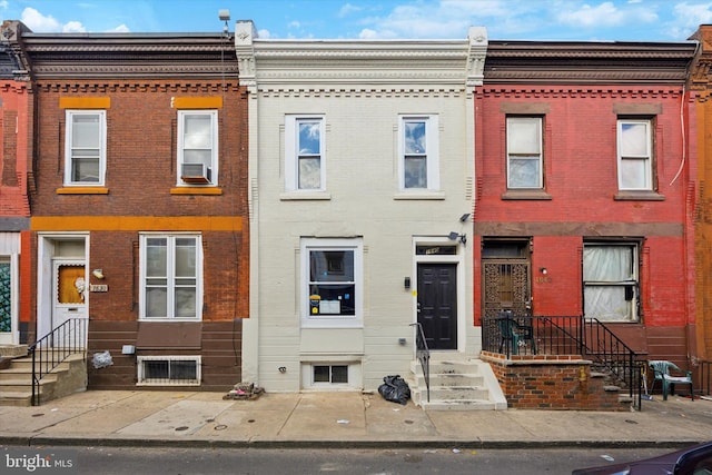 multi unit property featuring brick siding