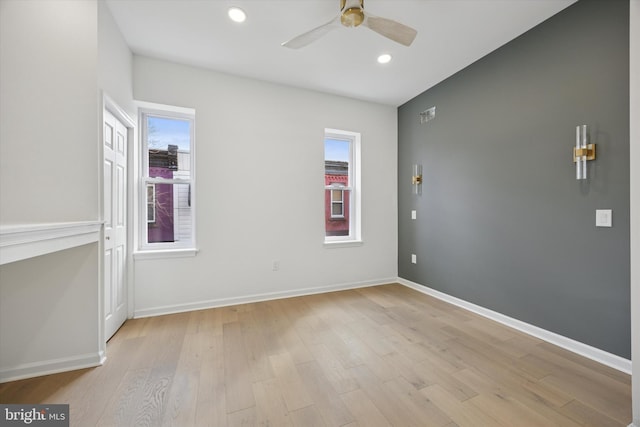 unfurnished room featuring recessed lighting, baseboards, ceiling fan, and light wood finished floors