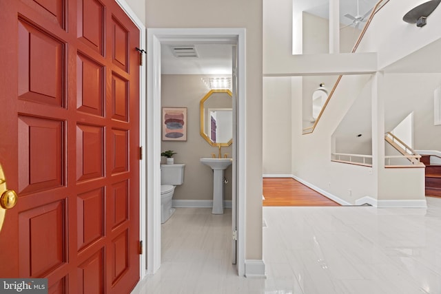 interior space with visible vents and baseboards