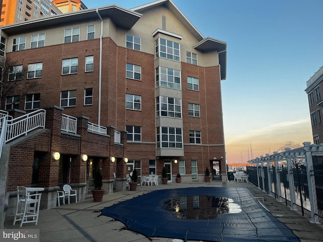 view of property at dusk