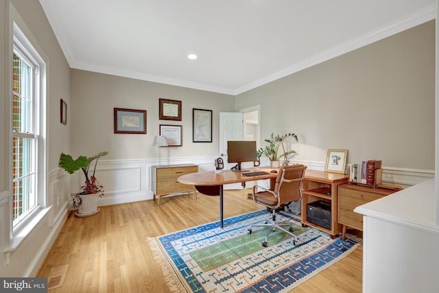 office area featuring crown molding, recessed lighting, a wainscoted wall, and light wood-type flooring