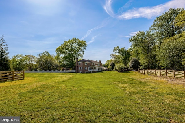 view of yard featuring fence