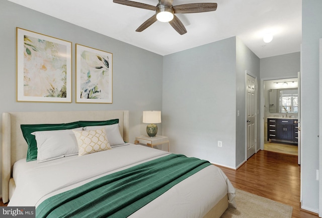 bedroom featuring wood finished floors and a ceiling fan