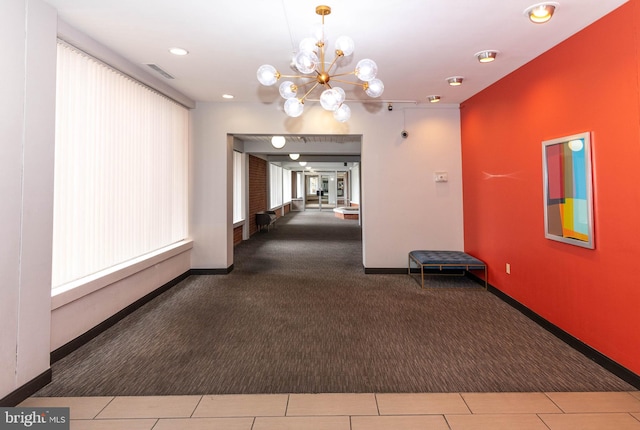 hall featuring recessed lighting, visible vents, baseboards, and carpet