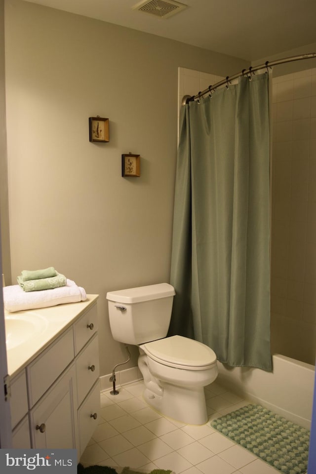 full bathroom featuring visible vents, toilet, tile patterned floors, vanity, and shower / bathtub combination with curtain