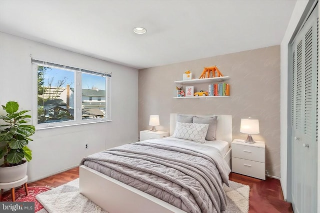 bedroom featuring wood finished floors