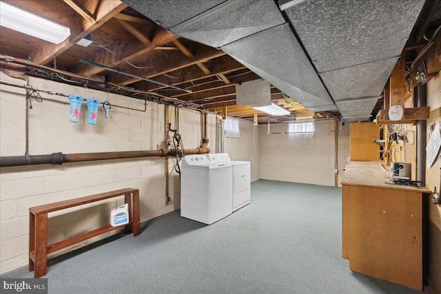 basement featuring independent washer and dryer