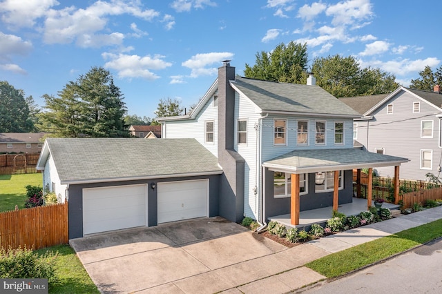 29 W Main St, Hershey, PA 17033 - view of front facade featuring a porch, driveway, an attached garage, a chimney, and roof with shingles