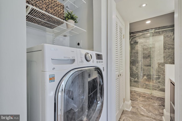 laundry room featuring washer / dryer, recessed lighting, marble finish floor, and laundry area