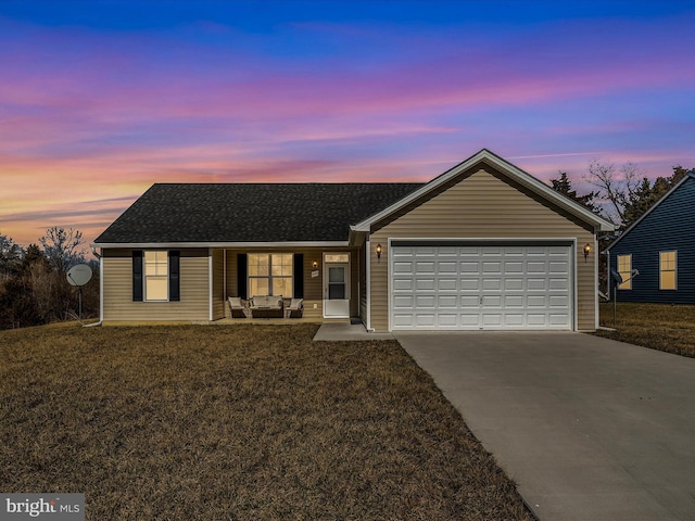 single story home featuring a porch, roof with shingles, a garage, a yard, and driveway