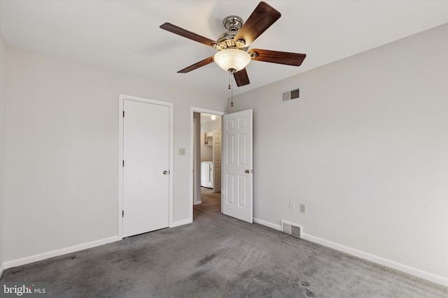 unfurnished bedroom featuring visible vents, carpet floors, and baseboards