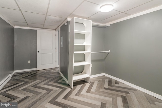 interior space featuring a paneled ceiling