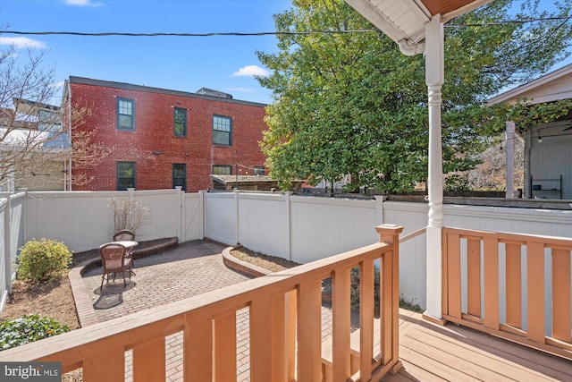 wooden deck featuring fence