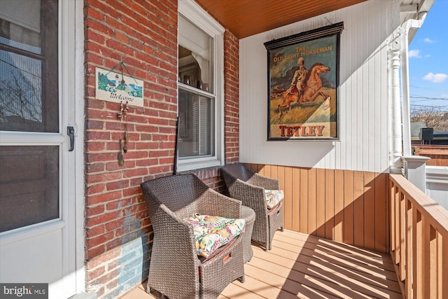 wooden terrace with covered porch