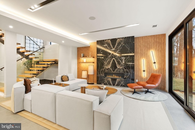 building lobby featuring stairway and visible vents