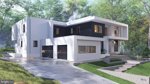 modern home with stucco siding, driveway, an attached garage, and a front lawn