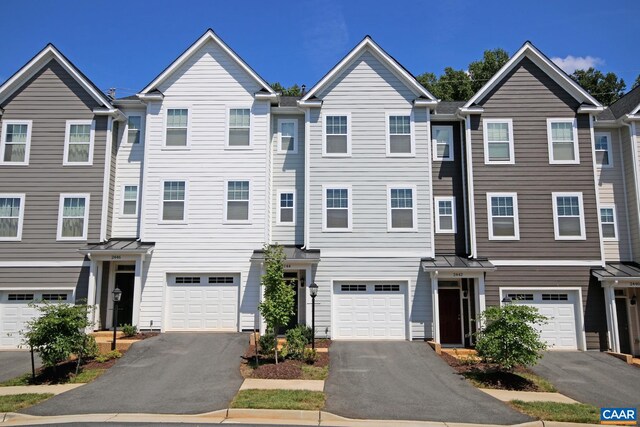 2444 Winthrop Dr, Charlottesville, VA 22911 - multi unit property with a garage, driveway, metal roof, and a standing seam roof