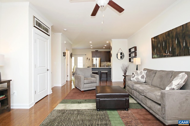 2444 Winthrop Dr, Charlottesville, VA 22911 - living room with recessed lighting, baseboards, wood finished floors, and crown molding