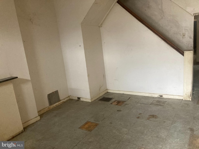 bonus room featuring tile patterned floors