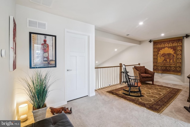 sitting room featuring recessed lighting, visible vents, and carpet floors