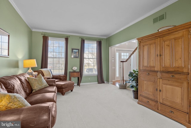 living room with visible vents, carpet flooring, crown molding, baseboards, and stairs