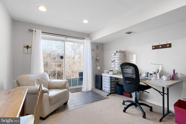 carpeted office with visible vents and recessed lighting